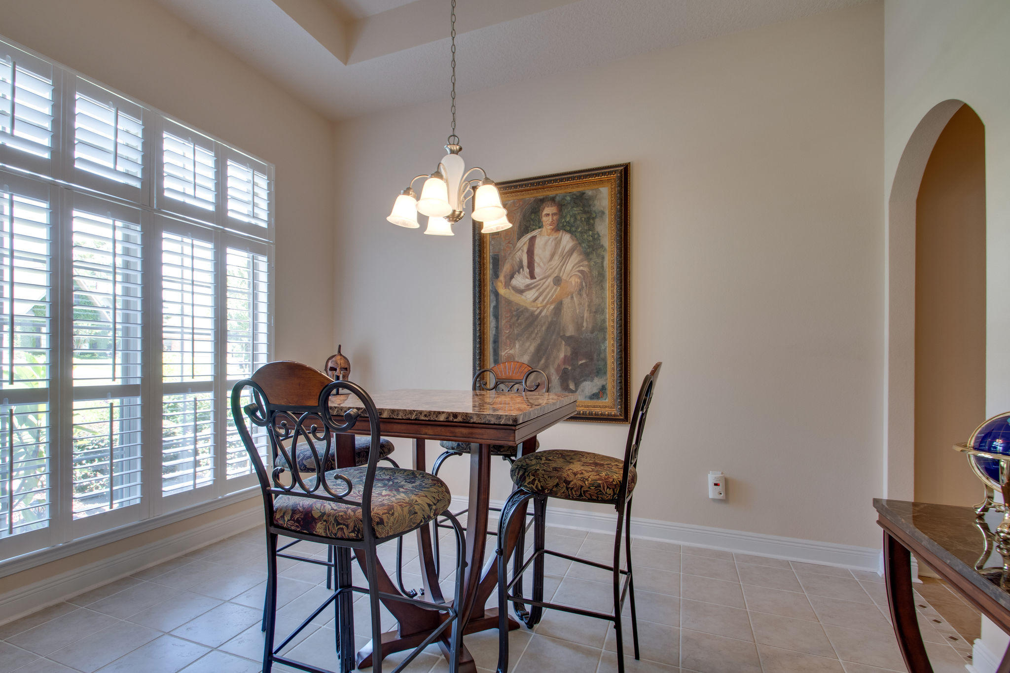 446 Mango Lane Freeport, FL 32439 - Photo 7 of 48 a view of a dining room with furniture and chandelier
