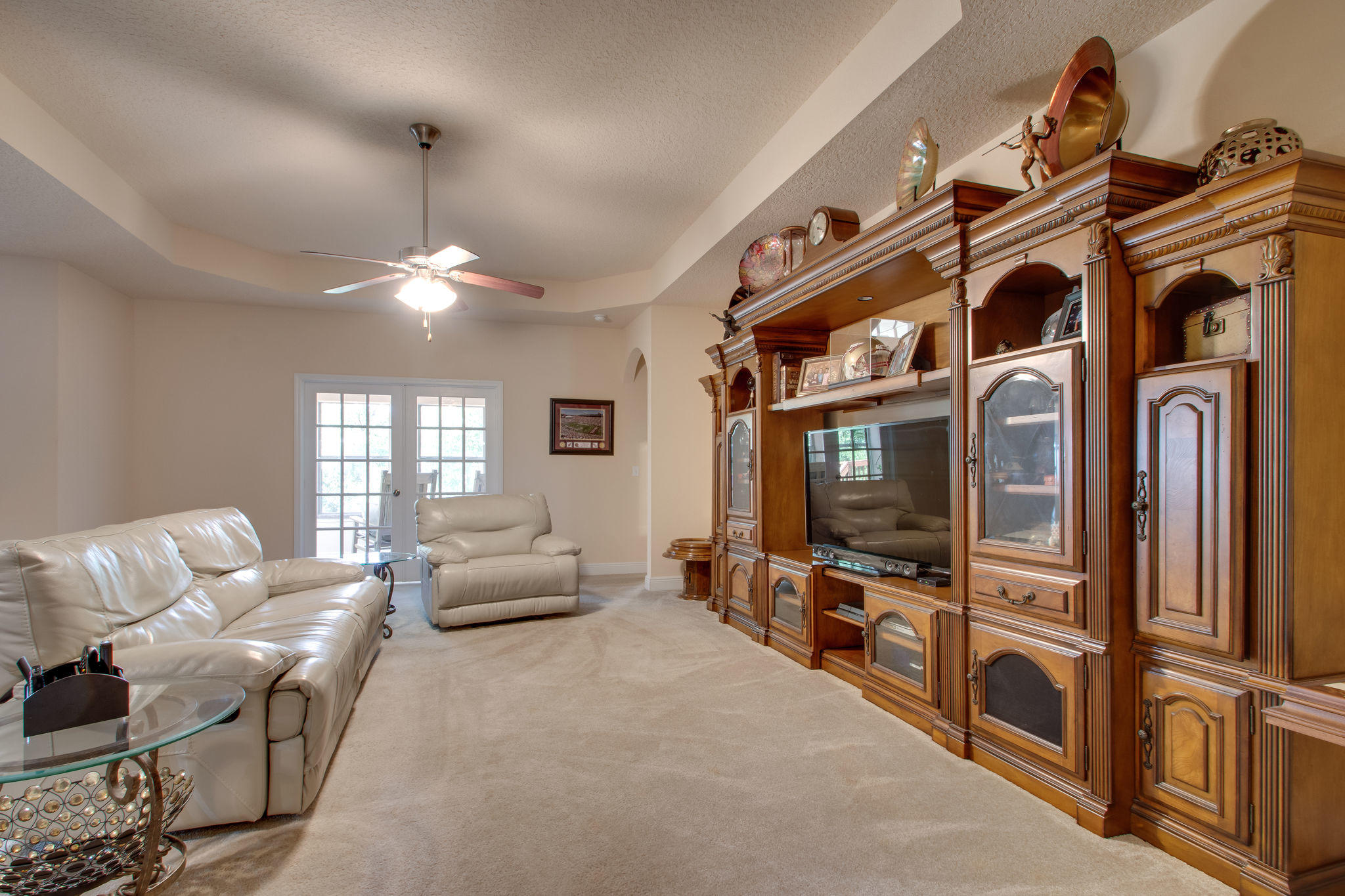 446 Mango Lane Freeport, FL 32439 - Photo 9 of 48 a living room with furniture fireplace and flat screen tv