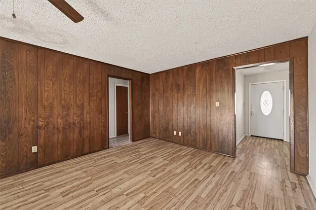 a view of a livingroom with wooden floor