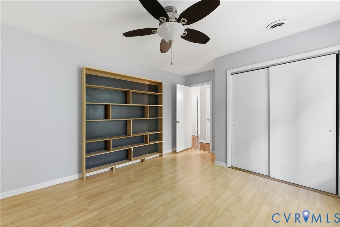 13622 Winterberry Ridge Midlothian, VA 23112 - Photo 24 of 47 a view of an empty room with a window and a kitchen