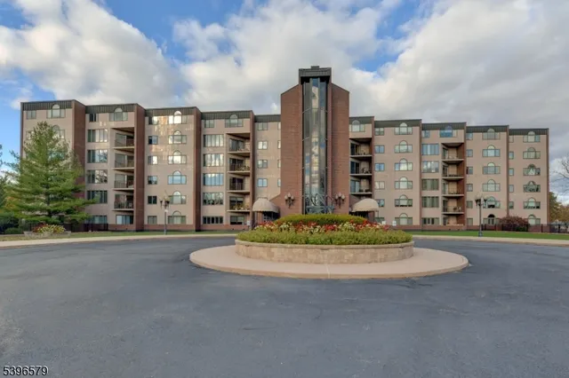 a sign that is sitting on a rock