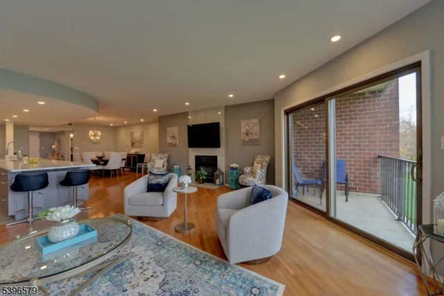a view of a chair and table in the balcony