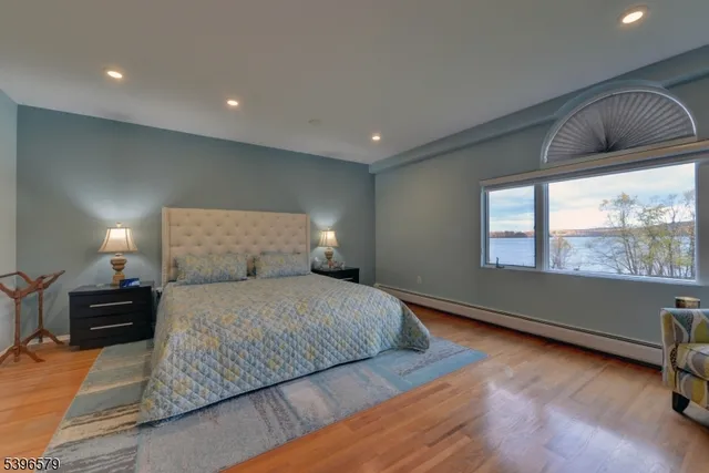 a room with furniture and flat screen tv