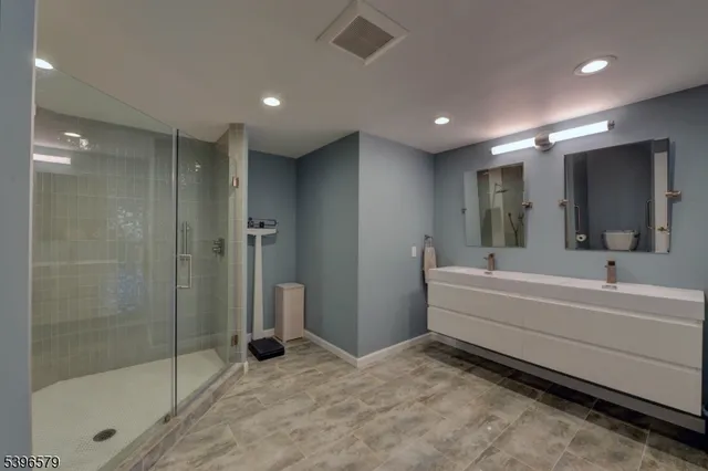 a bathroom with a shower and a toilet