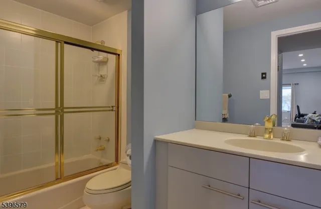 a view of a living room and dining room