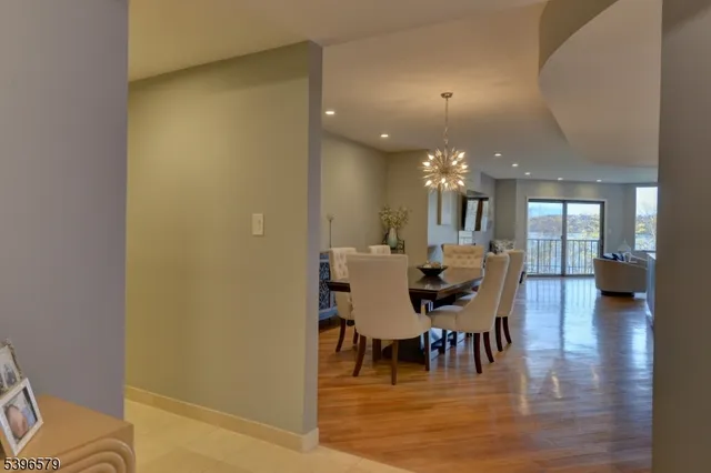 a living room with fireplace furniture and a flat screen tv