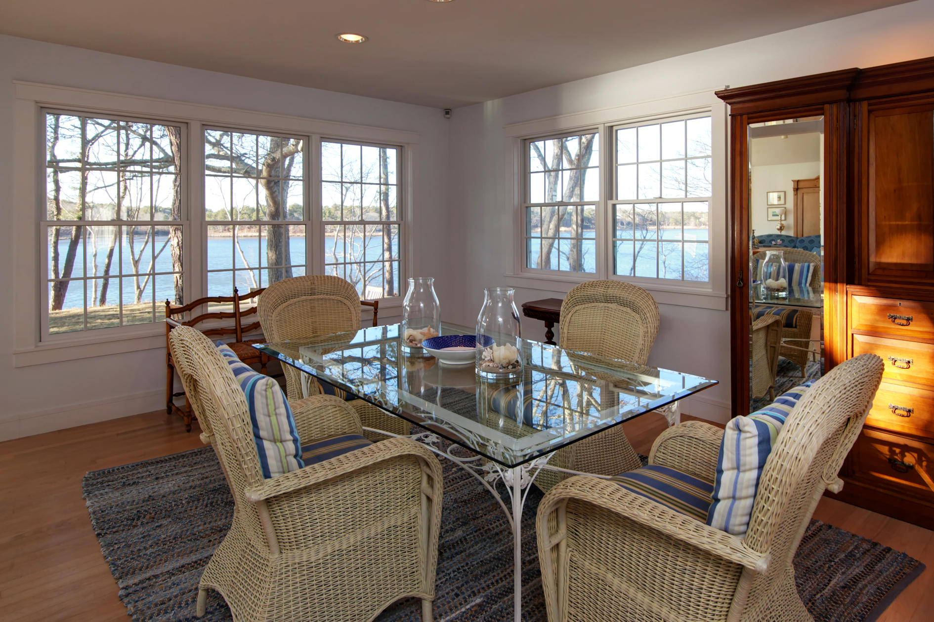 624 Poponessett Road Cotuit, MA 02635 - Photo 5 of 30 a view of a dining room with furniture window and outside view