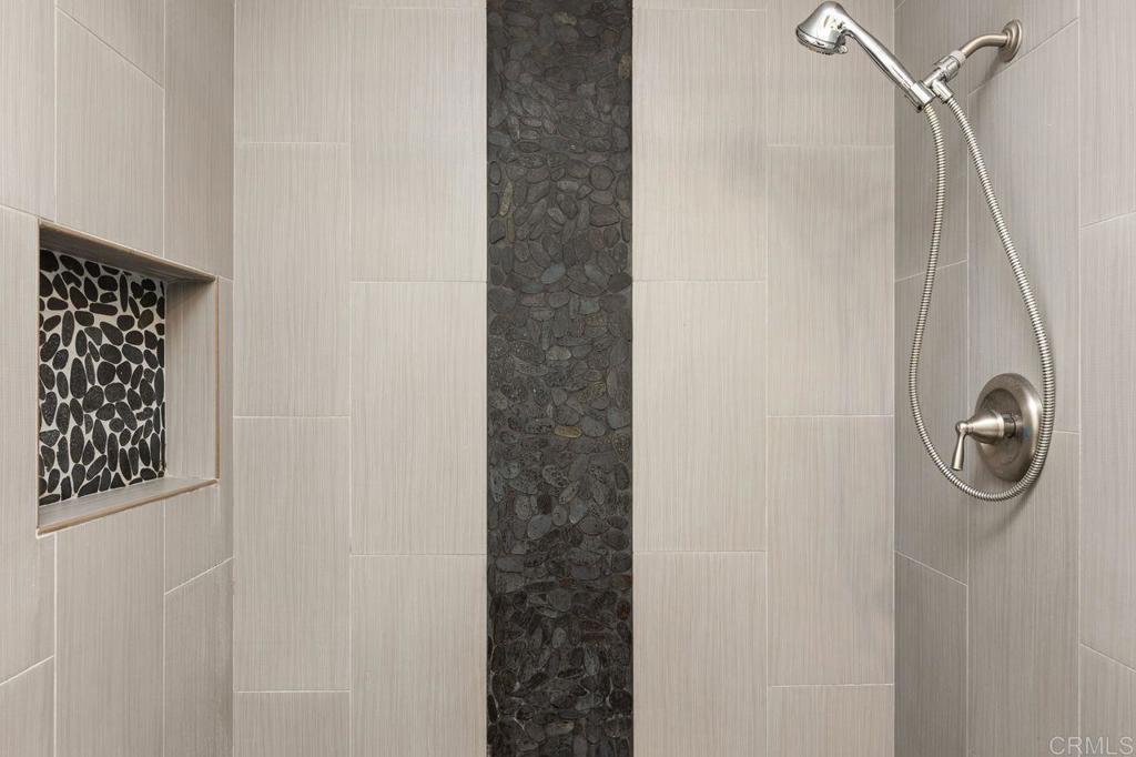 4369 Dowitcher Way Oceanside, CA 92057 - Photo 19 of 37 a close view of a shower in a bathroom