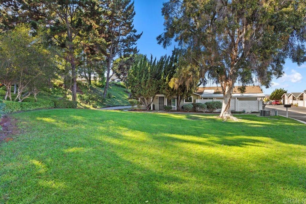 4369 Dowitcher Way Oceanside, CA 92057 - Photo 29 of 37 a view of a park with bench and trees
