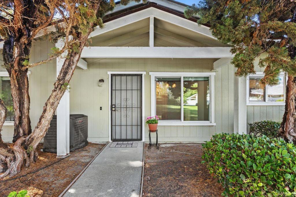 4369 Dowitcher Way Oceanside, CA 92057 - Photo 5 of 37 a front view of a house with a yard