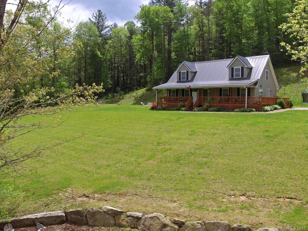 315 Garren Creek Road Rosman, NC 28772 - Photo 2 of 36 a view of a house with a yard