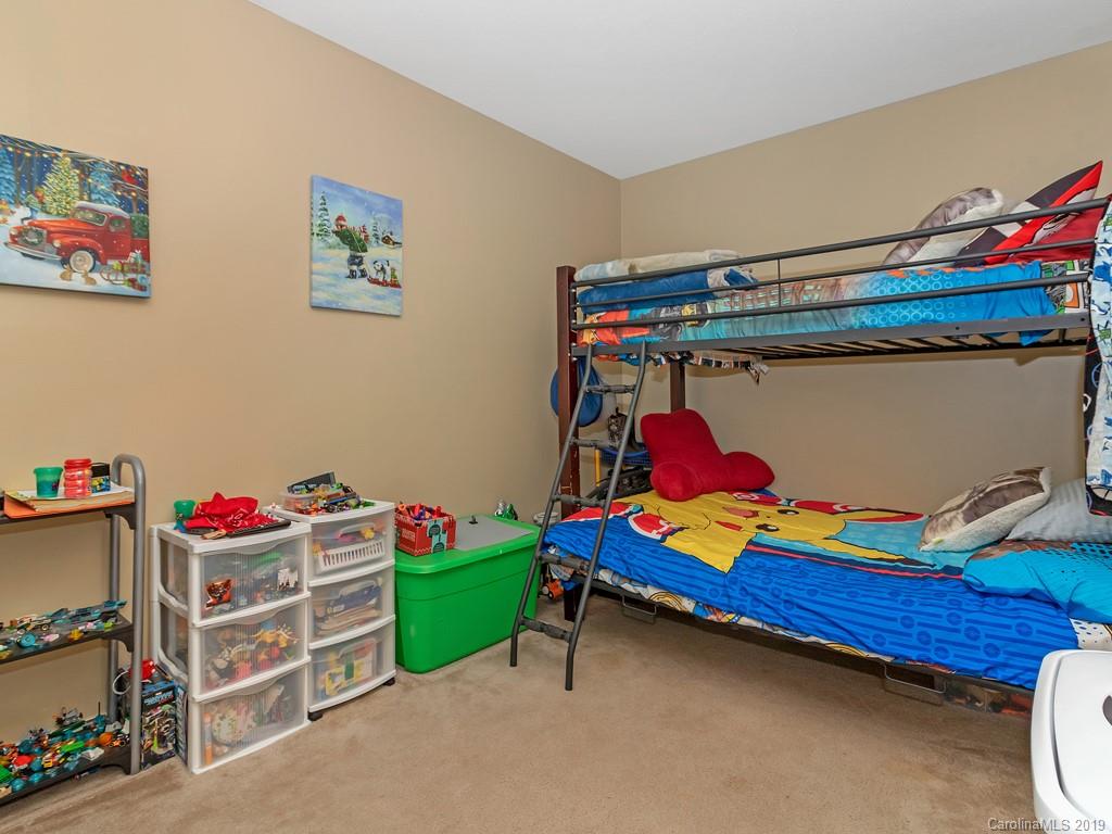 315 Garren Creek Road Rosman, NC 28772 - Photo 16 of 36 a room with toys and storage