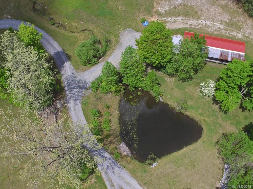 315 Garren Creek Road Rosman, NC 28772 - Photo 24 of 36 an aerial view of a house with a yard
