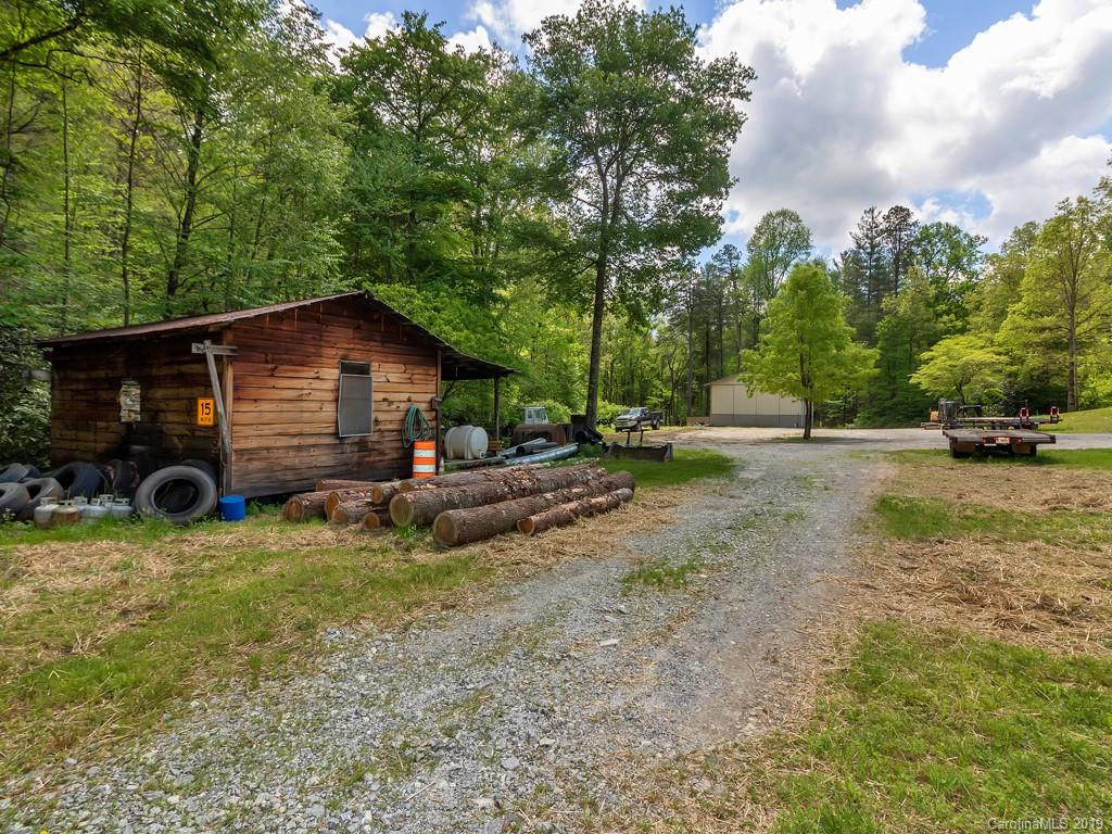 315 Garren Creek Road Rosman, NC 28772 - Photo 28 of 36 a view of a house with backyard and sitting area