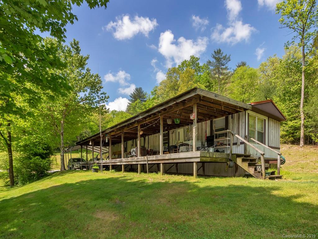 315 Garren Creek Road Rosman, NC 28772 - Photo 36 of 36 a view of a house with a garden