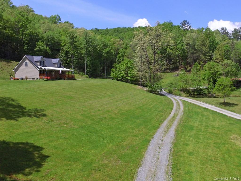 315 Garren Creek Road Rosman, NC 28772 - Photo 5 of 36 a view of a house with a yard