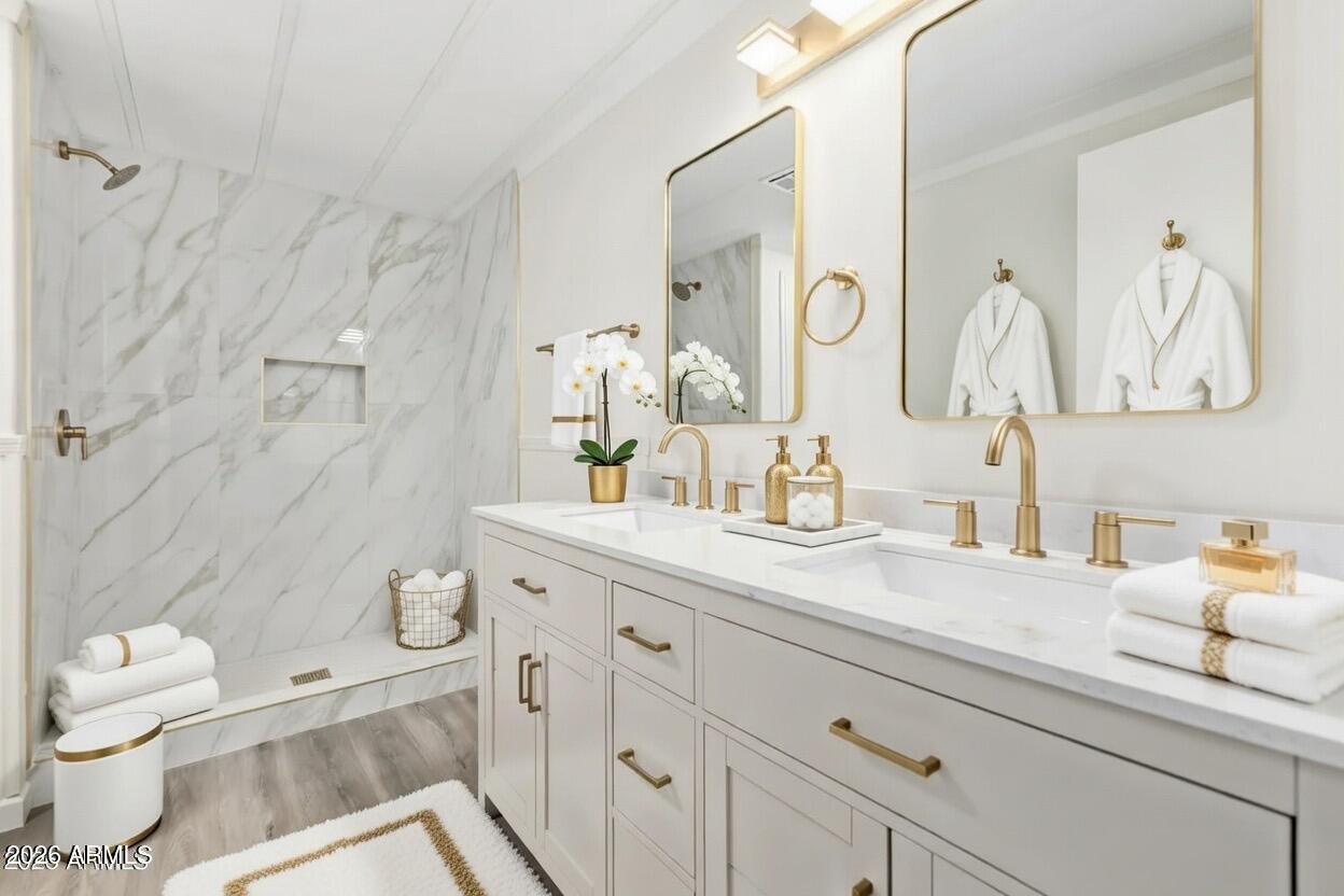 16216 North 35th Way Phoenix, AZ 85032 - Photo 12 of 17 a bathroom with a granite countertop sink mirror vanity and toilet