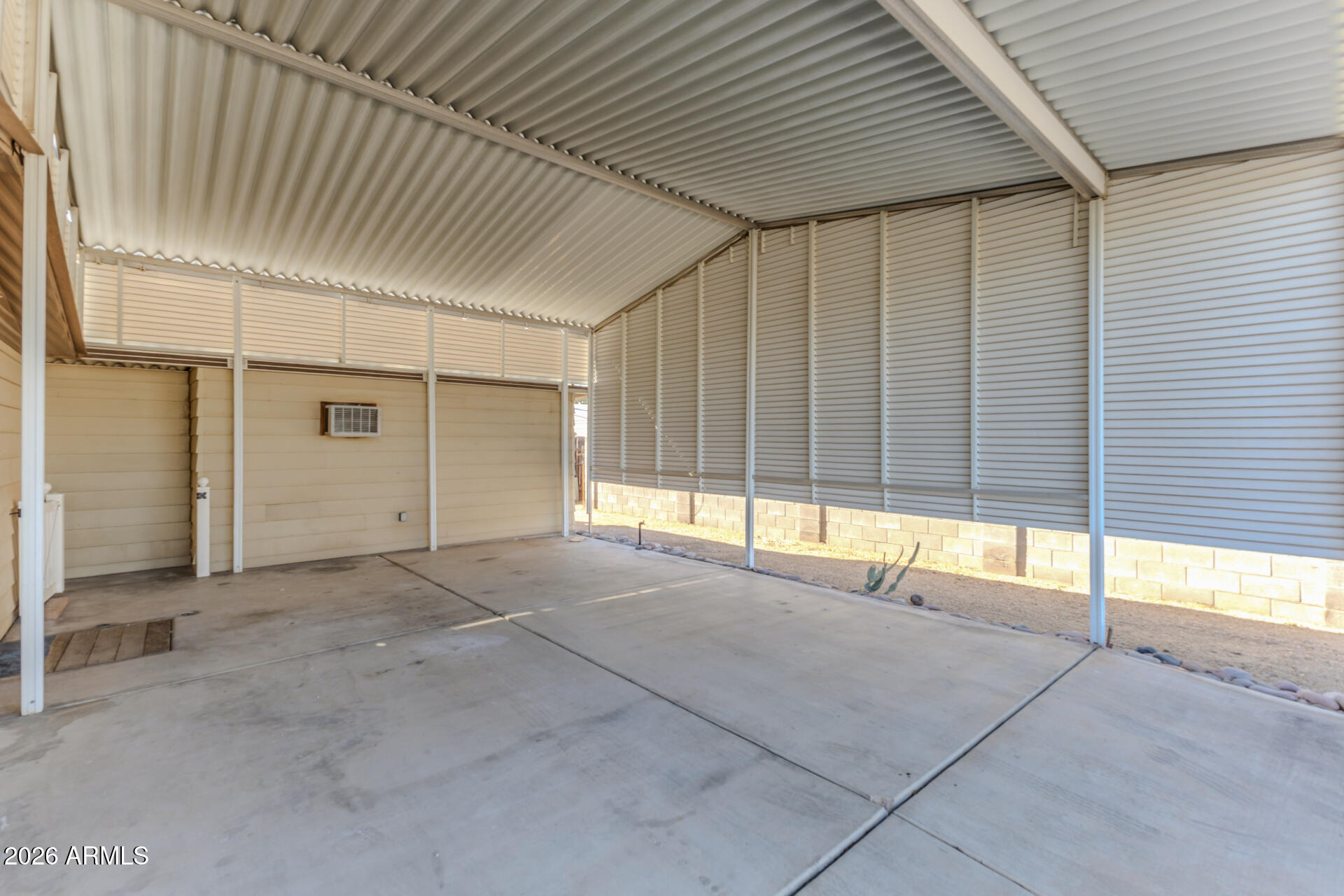 16216 North 35th Way Phoenix, AZ 85032 - Photo 17 of 17 a view of an empty room with a fireplace