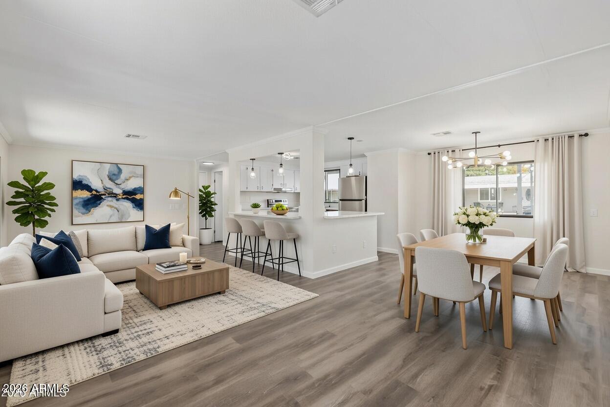 16216 North 35th Way Phoenix, AZ 85032 - Photo 4 of 17 a living room with furniture and wooden floor