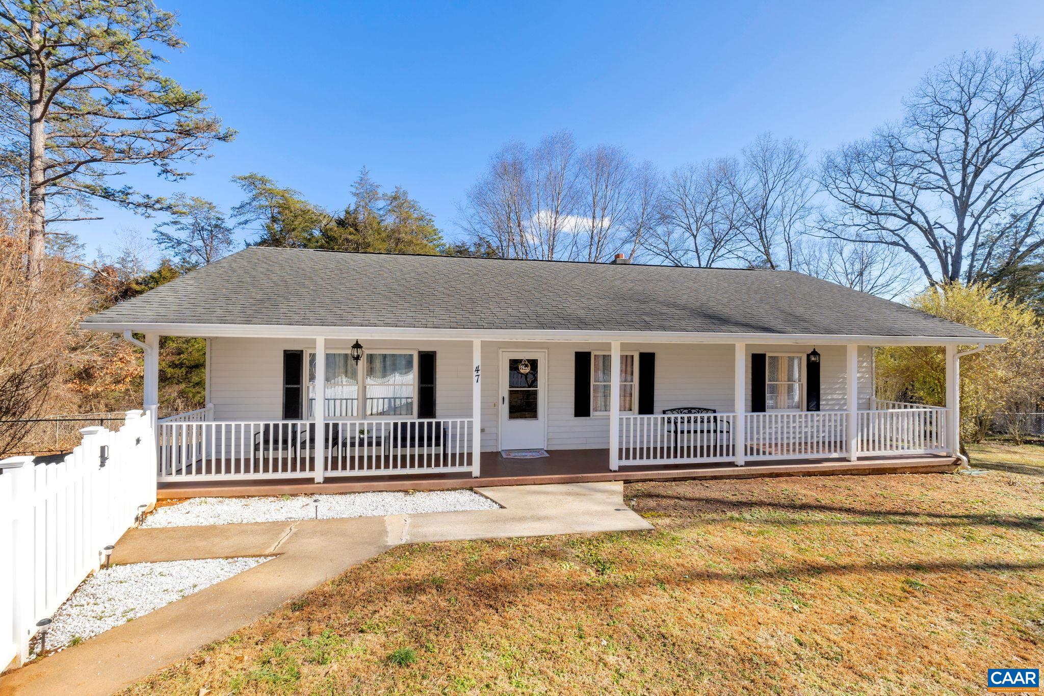 47 Dandelion Road Ruckersville, VA 22968 - Photo 1 of 35 a front view of a house with a yard