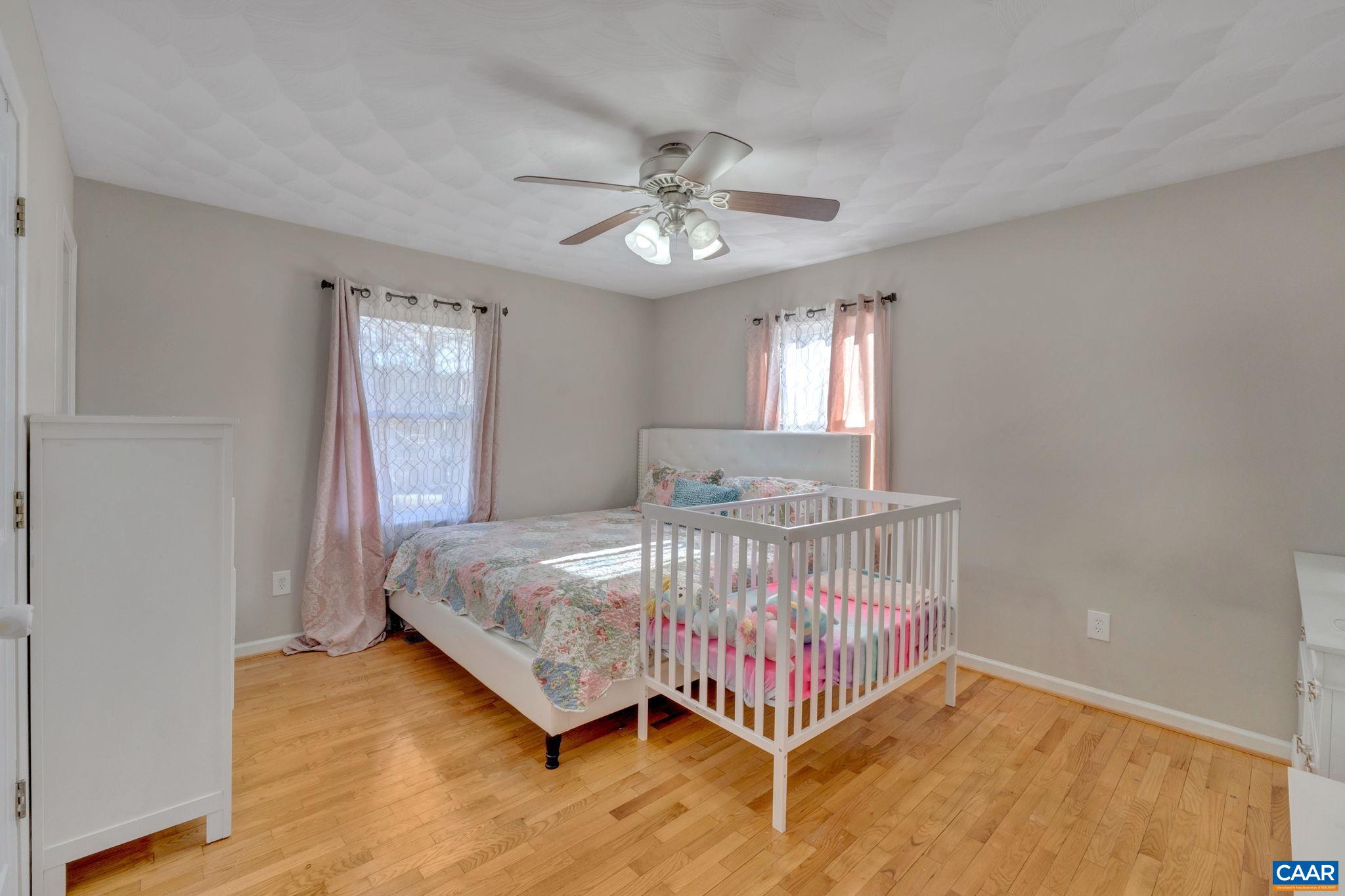 47 Dandelion Road Ruckersville, VA 22968 - Photo 12 of 35 a bedroom with a bed and window