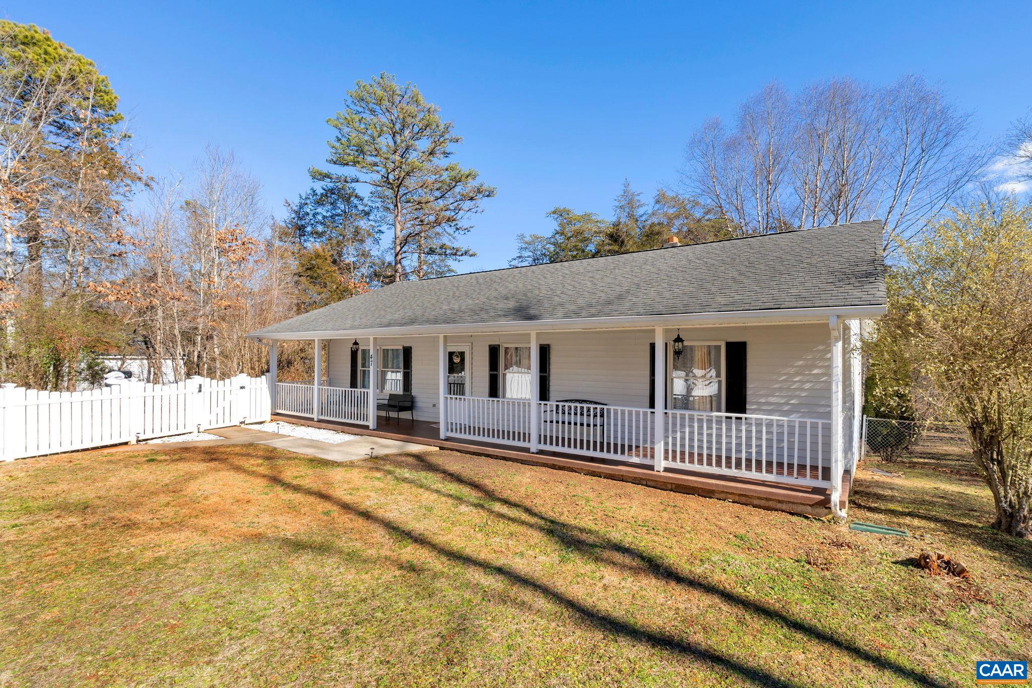 47 Dandelion Road Ruckersville, VA 22968 - Photo 2 of 35 a house view with a outdoor space