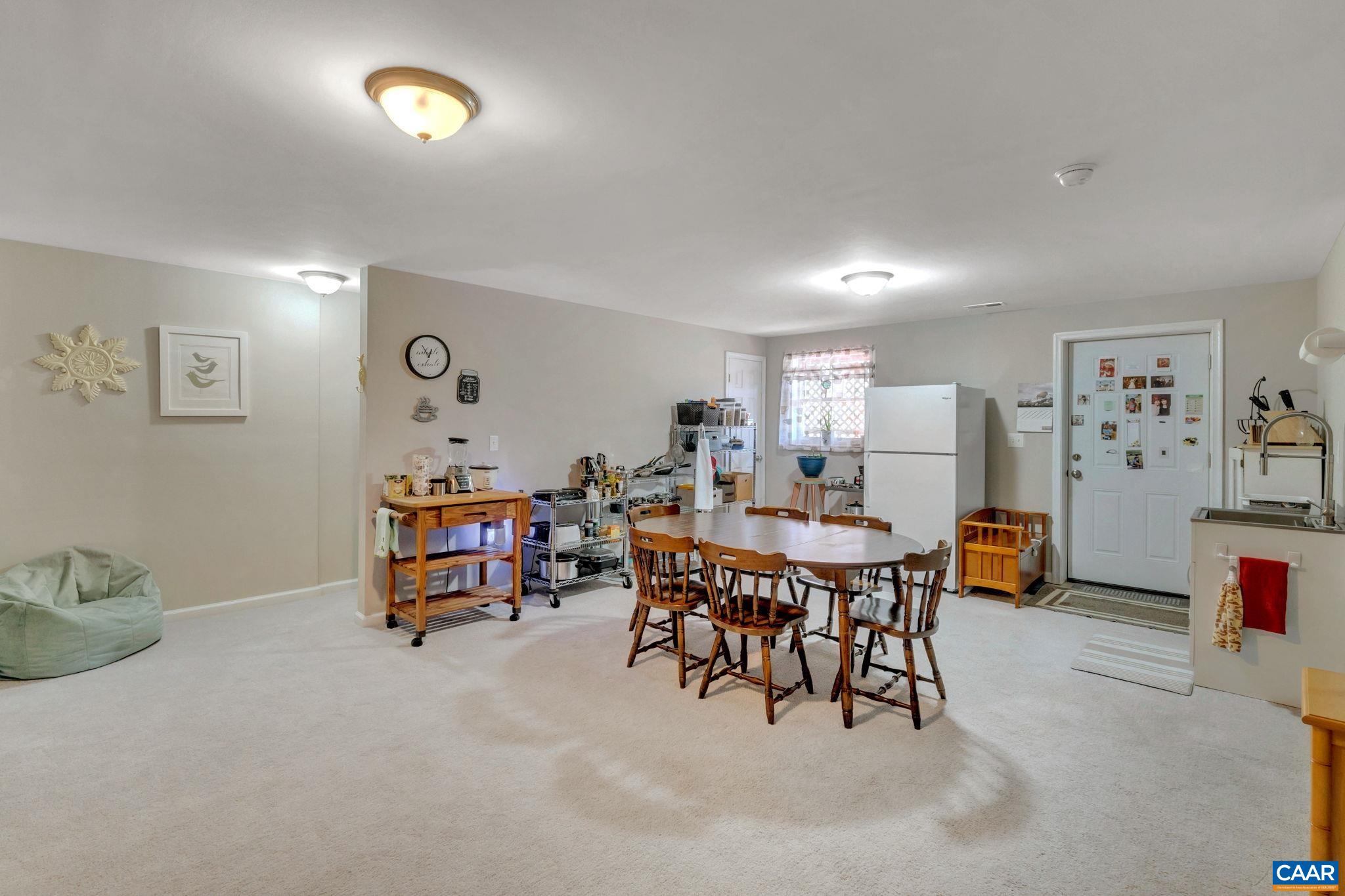 47 Dandelion Road Ruckersville, VA 22968 - Photo 21 of 35 a dining room with furniture and a table