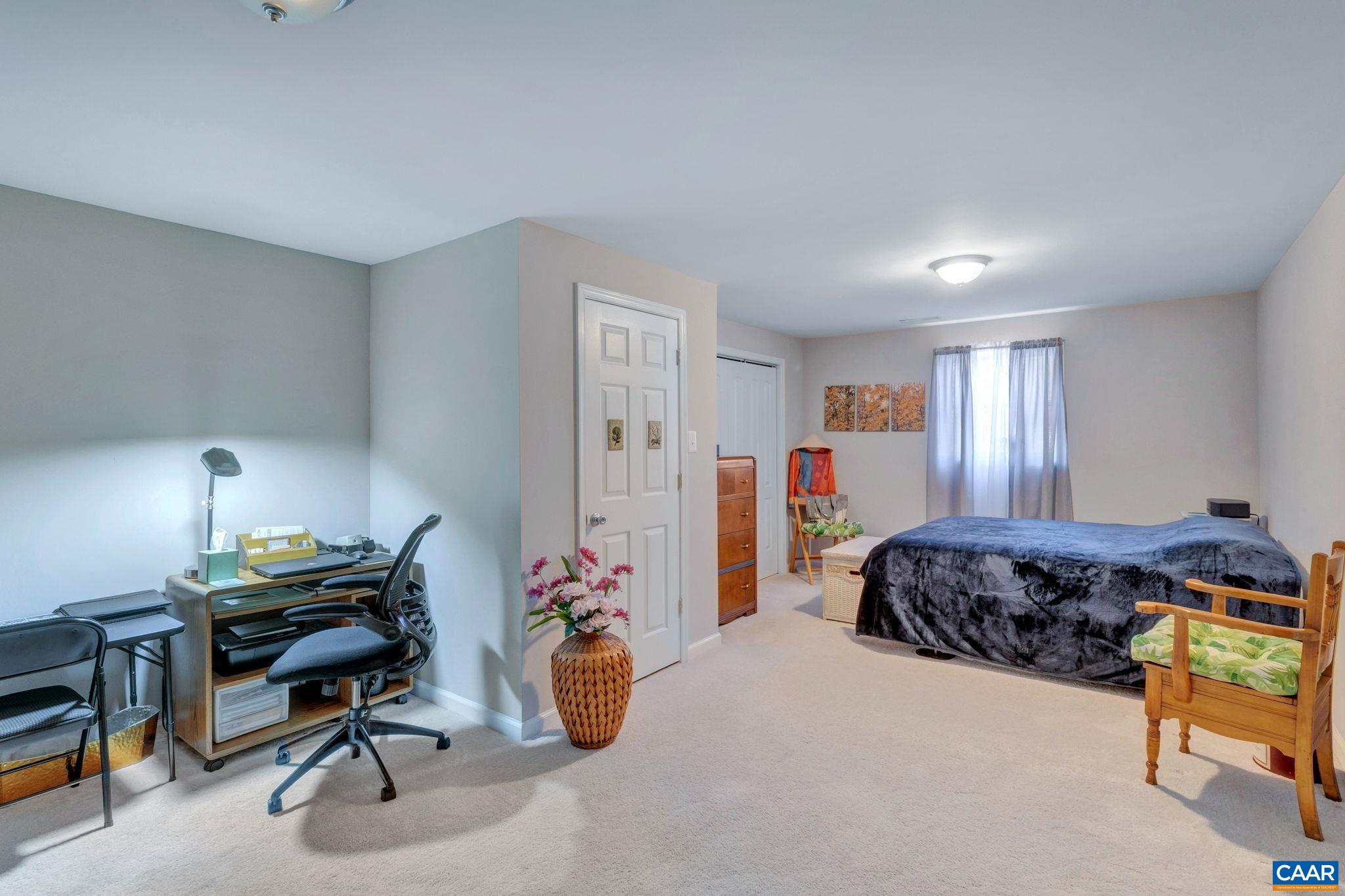 47 Dandelion Road Ruckersville, VA 22968 - Photo 23 of 35 a bedroom with a workspace