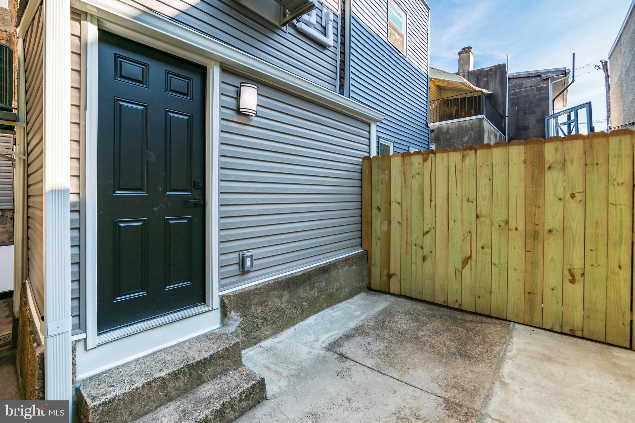 1844 South 23rd Street, Unit 1F Philadelphia, PA 19145 - Photo 15 of 21 a view of a house with a door