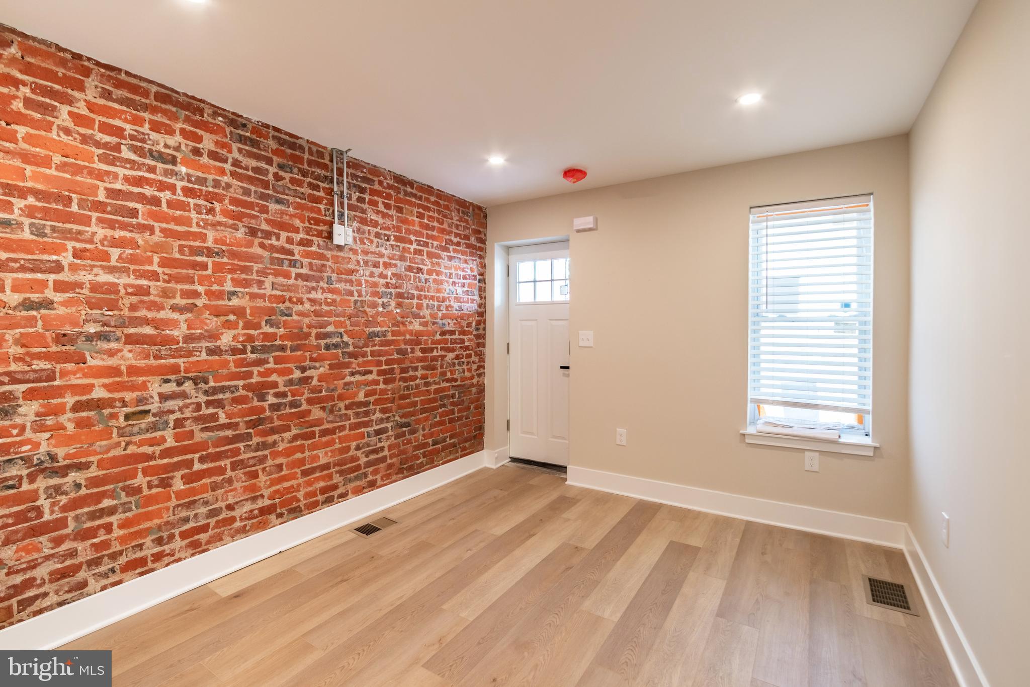 1844 South 23rd Street, Unit 1F Philadelphia, PA 19145 - Photo 6 of 21 a view of an empty room and a window