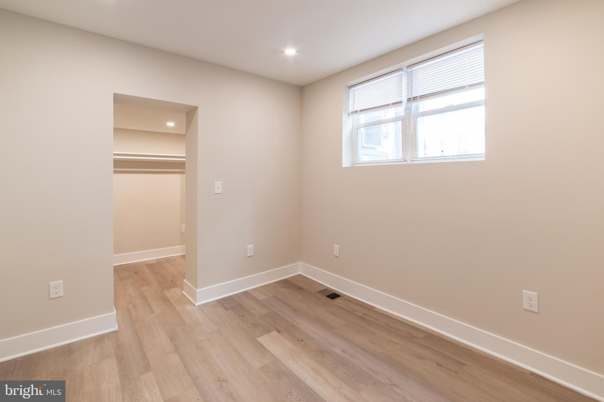 1844 South 23rd Street, Unit 1F Philadelphia, PA 19145 - Photo 8 of 21 an empty room with a workspace