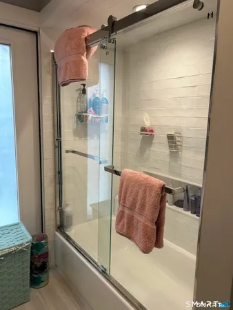 a bathroom with a bathtub