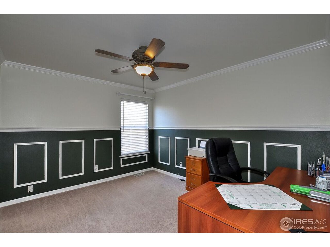 126 52nd Avenue Greeley, CO 80634 - Photo 15 of 24 a view of a livingroom with furniture and front door