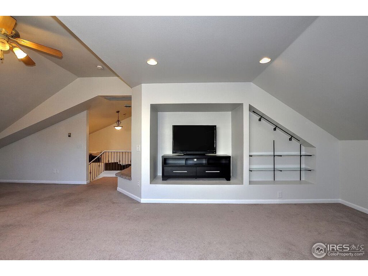 126 52nd Avenue Greeley, CO 80634 - Photo 18 of 24 a view of a livingroom with furniture and a flat screen tv