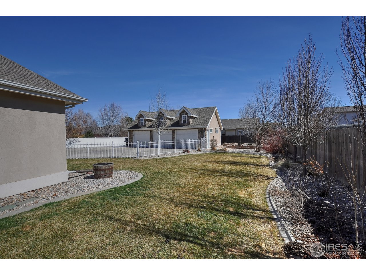 126 52nd Avenue Greeley, CO 80634 - Photo 22 of 24 a house view with a garden space