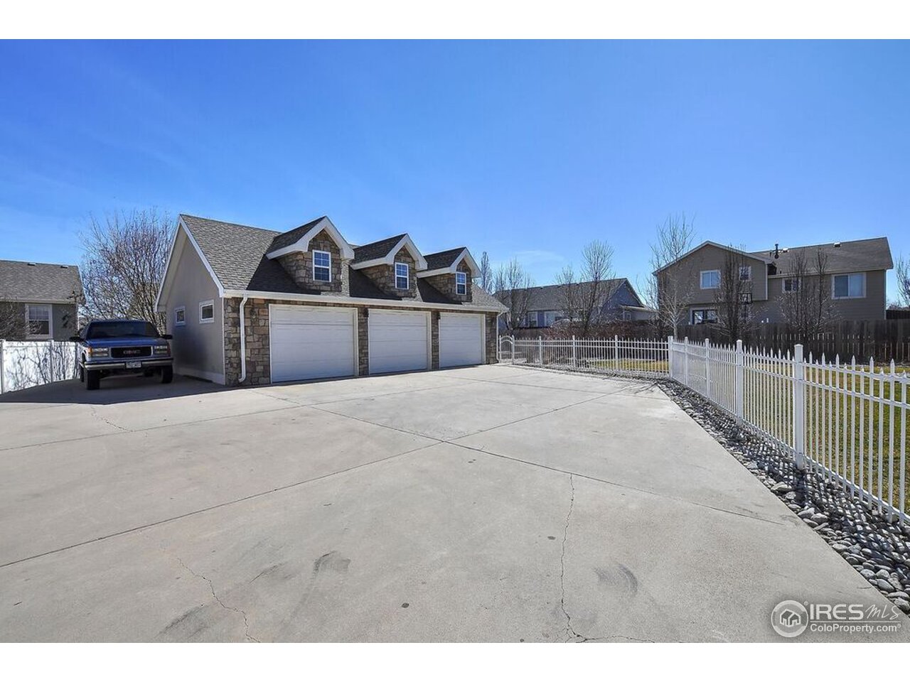 126 52nd Avenue Greeley, CO 80634 - Photo 3 of 24 a view of a car park in front of house