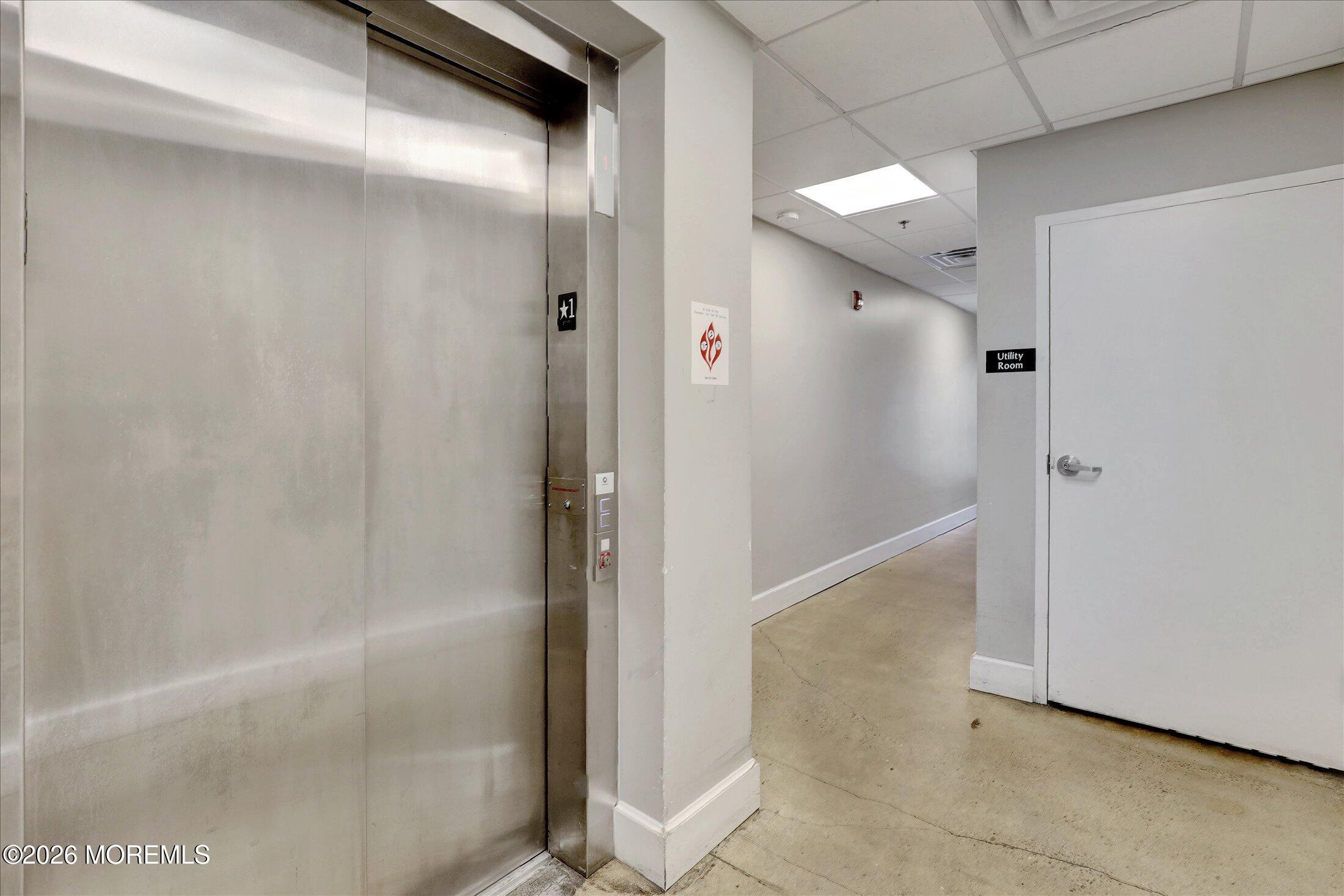 55 Brighton Avenue, Unit 4 Long Branch, NJ 07740 - Photo 27 of 36 a bathroom with a glass shower door