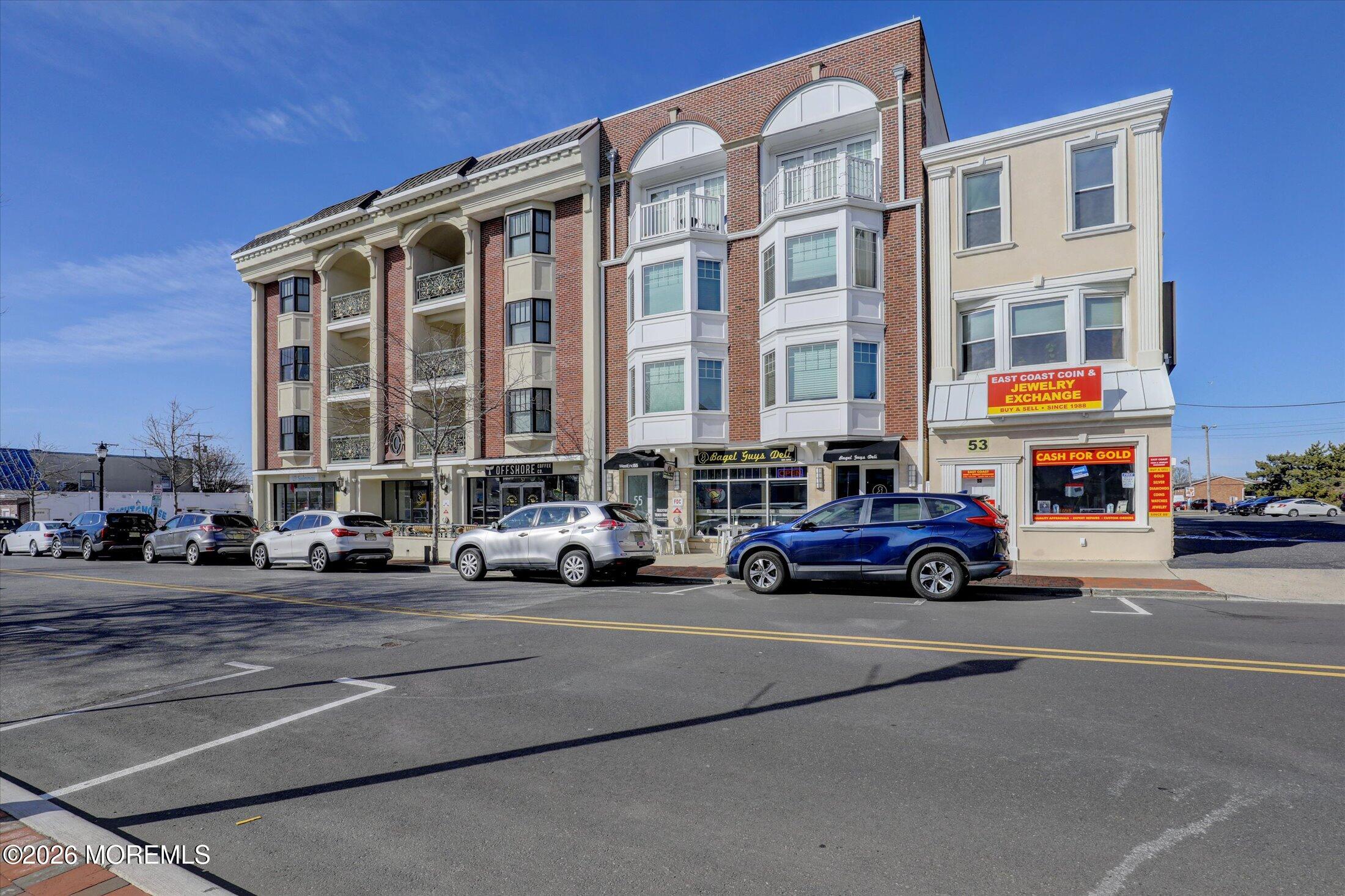 55 Brighton Avenue, Unit 4 Long Branch, NJ 07740 - Photo 5 of 36 a car parked in front of a building