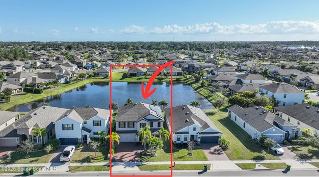 a kitchen with stainless steel appliances granite countertop wooden cabinets a stove top oven and granite counter top