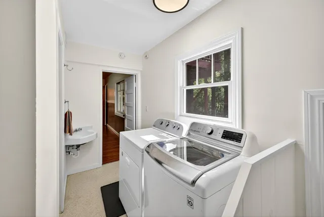 a utility room with dryer and washer