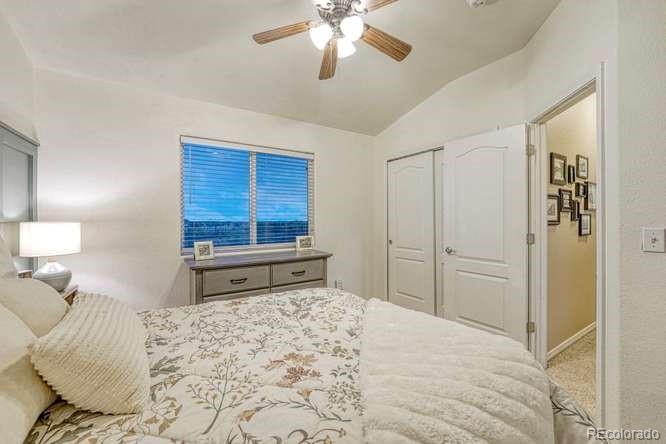 12365 Point Reyes Drive Peyton, CO 80831 - Photo 15 of 44 a bedroom with a bed and a window