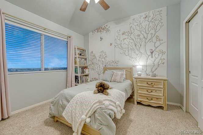 12365 Point Reyes Drive Peyton, CO 80831 - Photo 16 of 44 a bedroom with a bed and a window