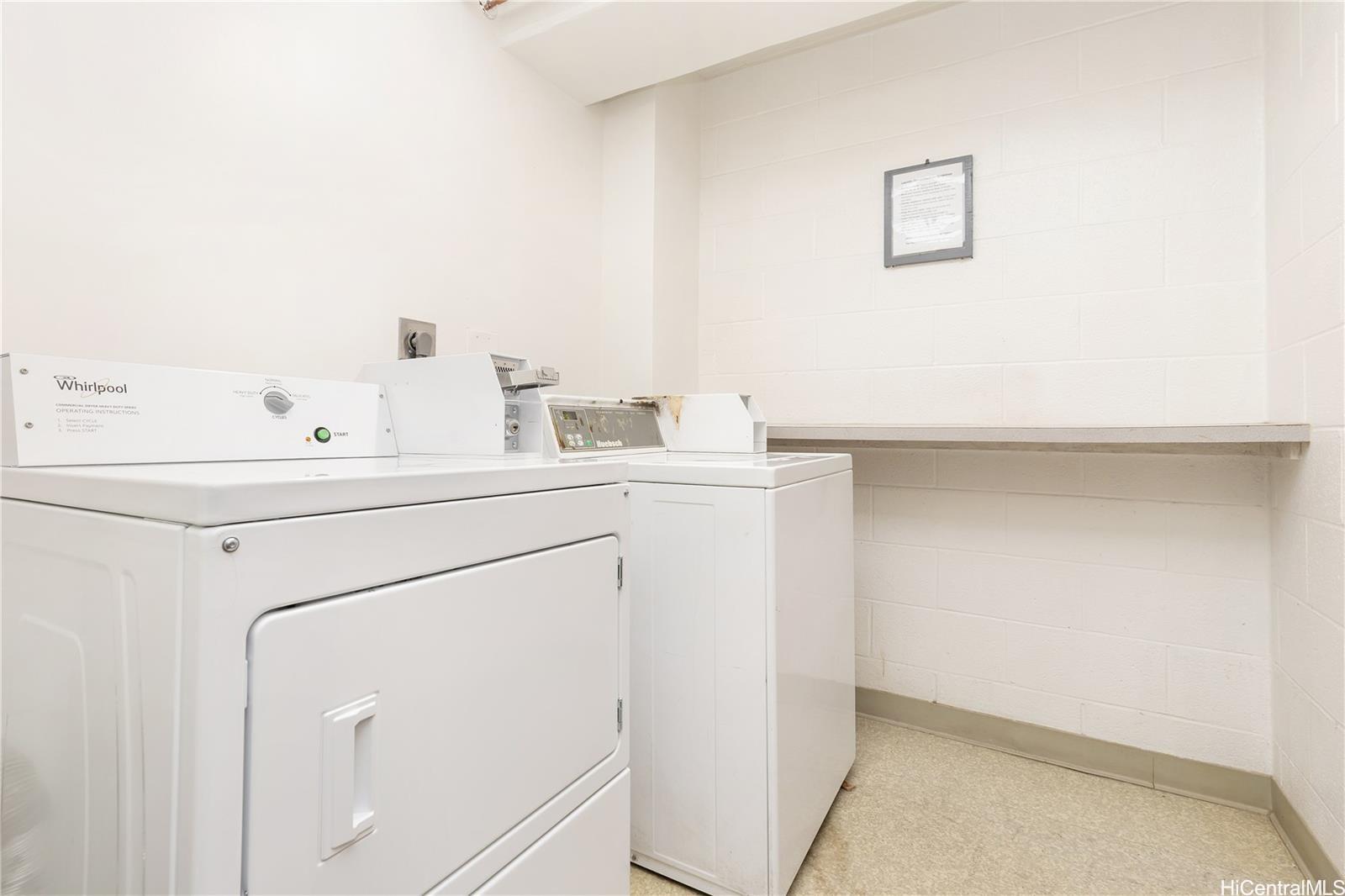 1415 Victoria Street, Unit 906 Honolulu, HI 96822 - Photo 16 of 16 a utility room with dryer and washer