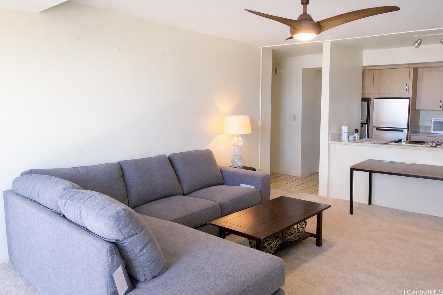 1415 Victoria Street, Unit 906 Honolulu, HI 96822 - Photo 8 of 16 a living room with furniture