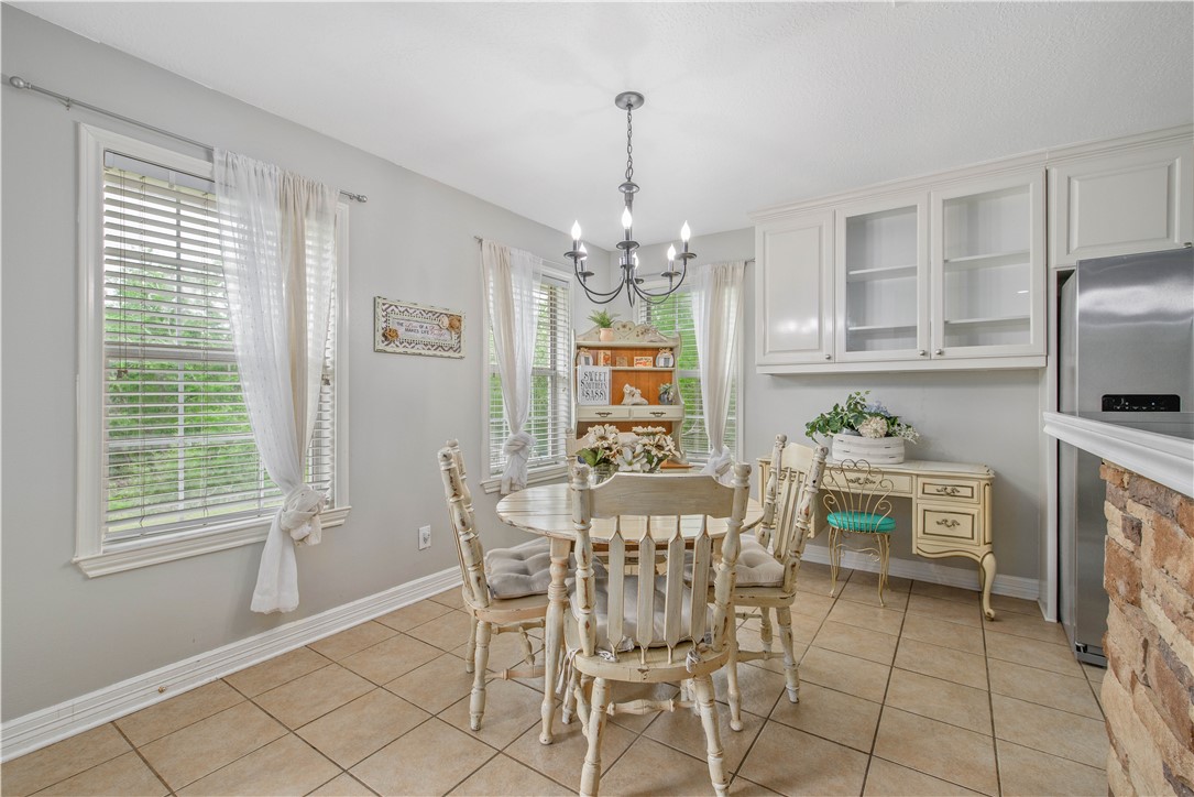 6538 Olympia Buddy Road College Station, TX 77845 - Photo 14 of 50 a dining room with furniture and window