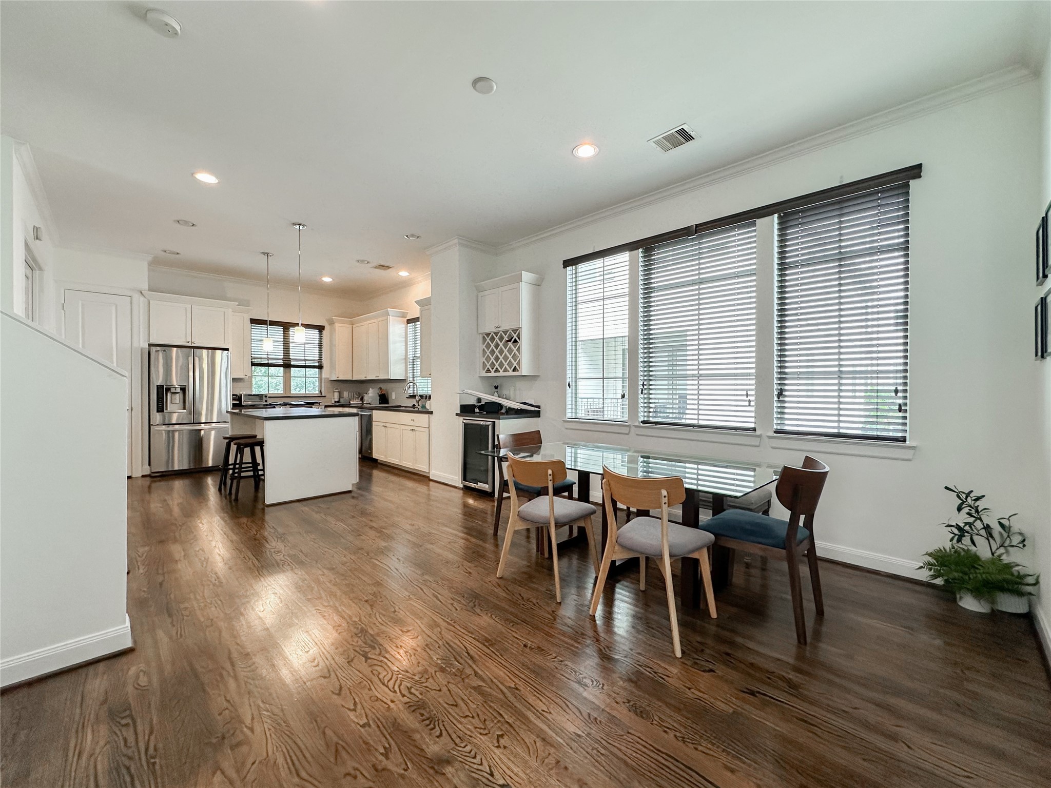 2 Hermann Park Court Houston, TX 77021 - Photo 11 of 43 a living room with furniture dining table and wooden floor