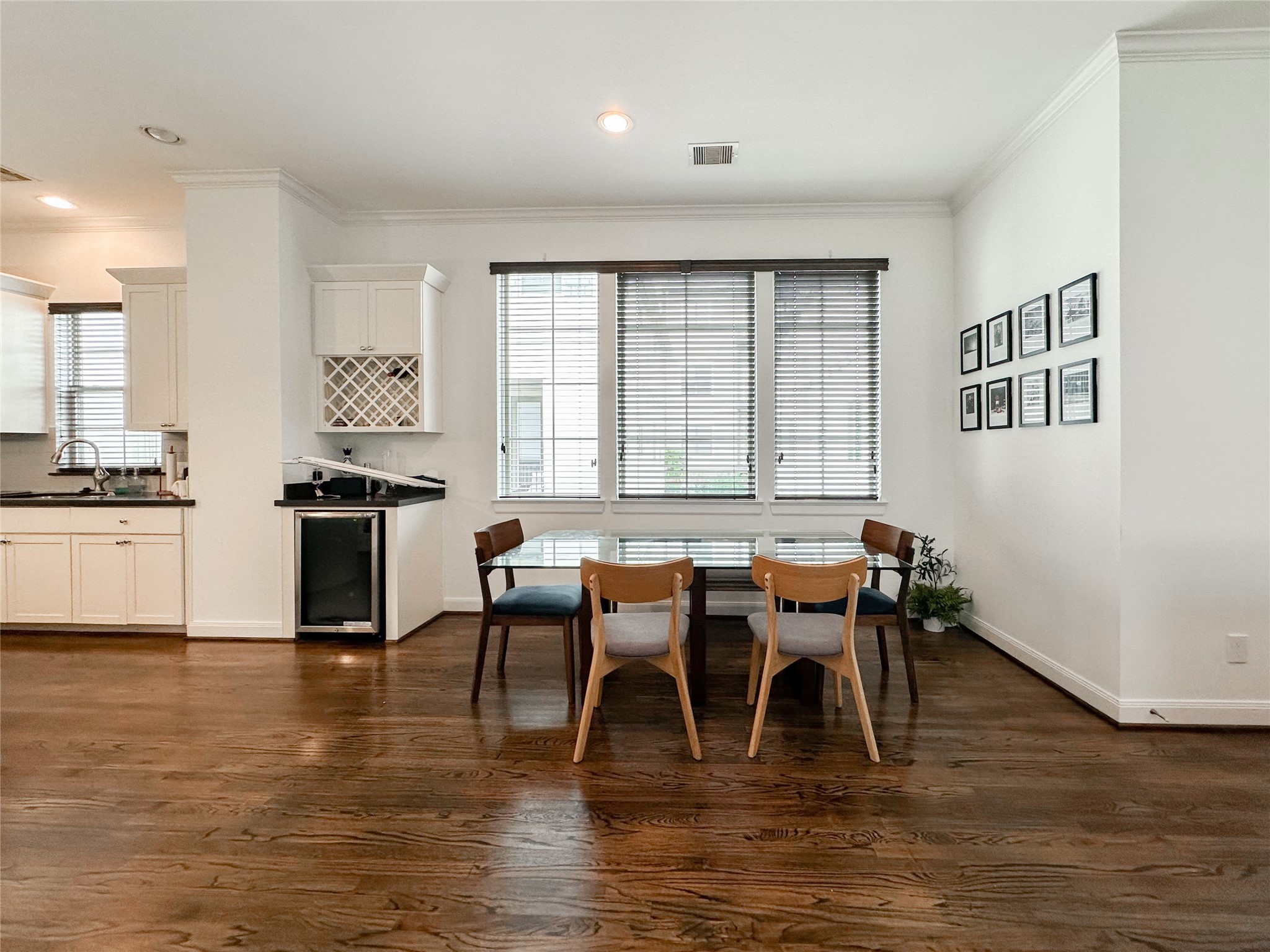 2 Hermann Park Court Houston, TX 77021 - Photo 12 of 43 a dining room with furniture and wooden floor