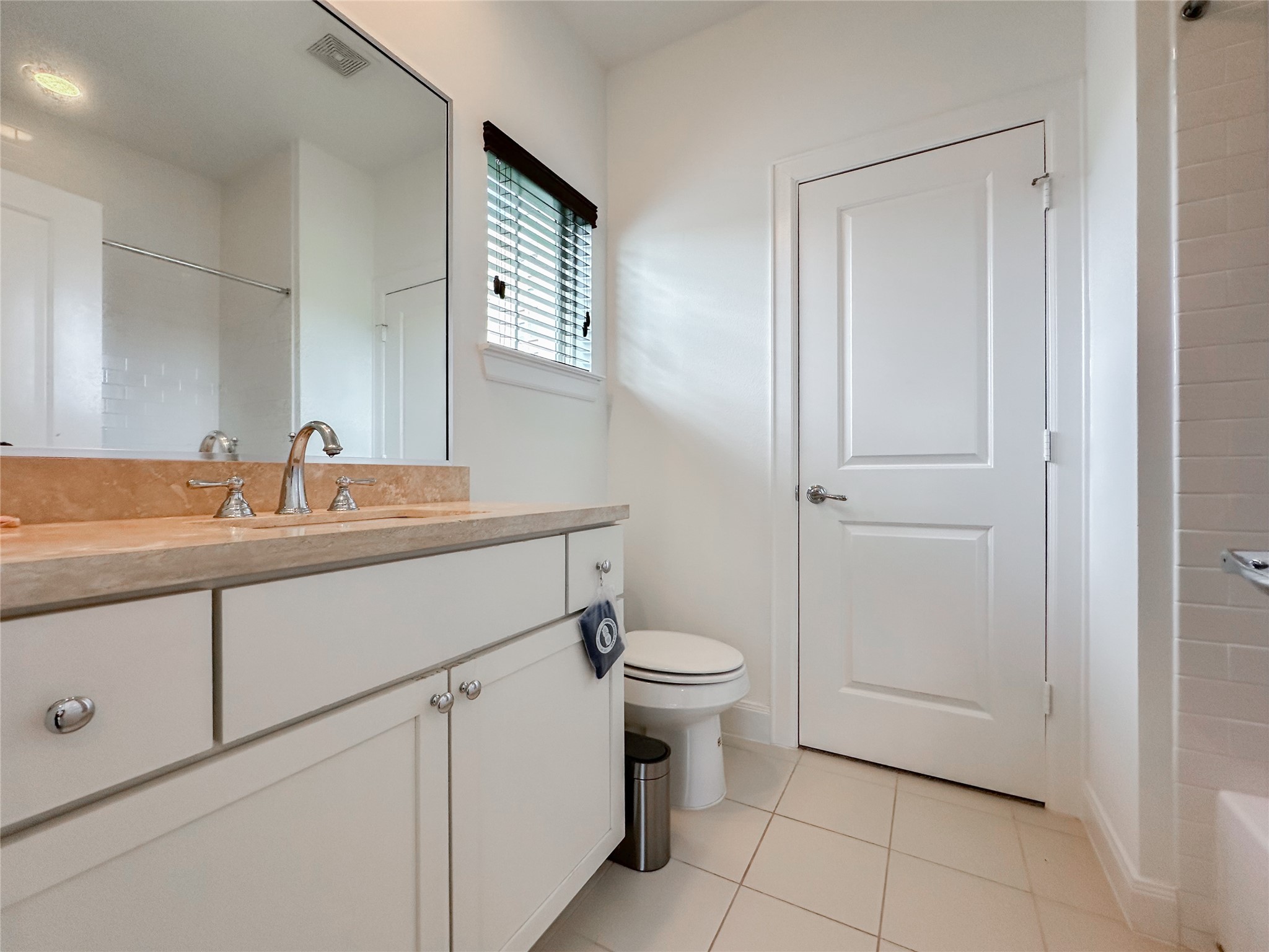 2 Hermann Park Court Houston, TX 77021 - Photo 35 of 43 a bathroom with a sink a toilet and mirror