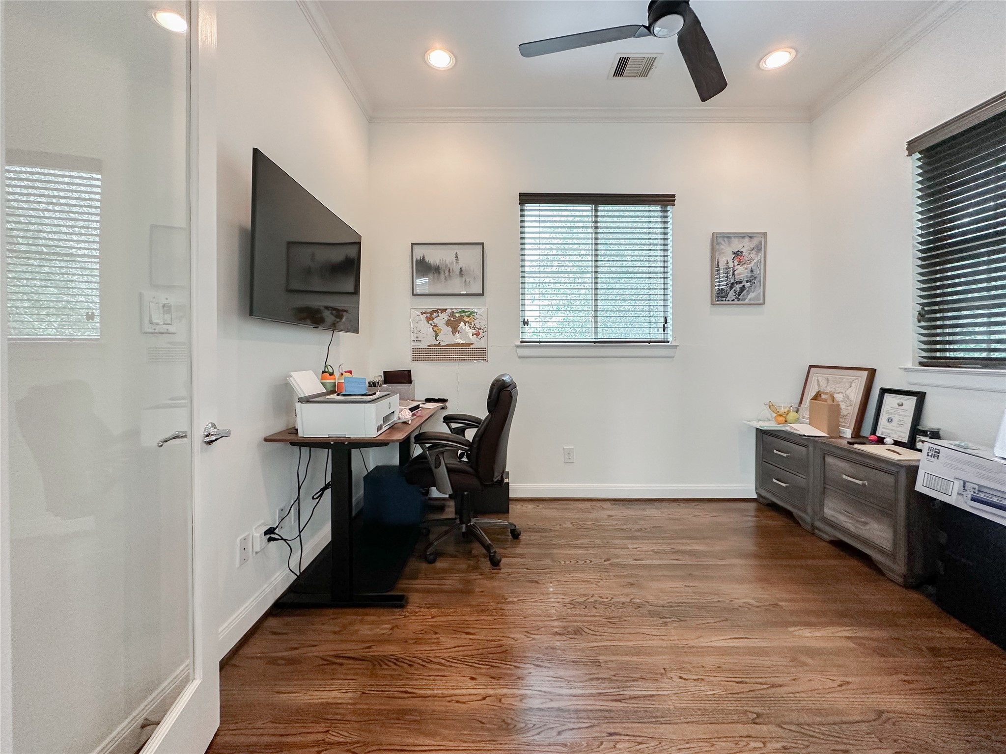 2 Hermann Park Court Houston, TX 77021 - Photo 38 of 43 a view of a workspace with wooden floor and a window