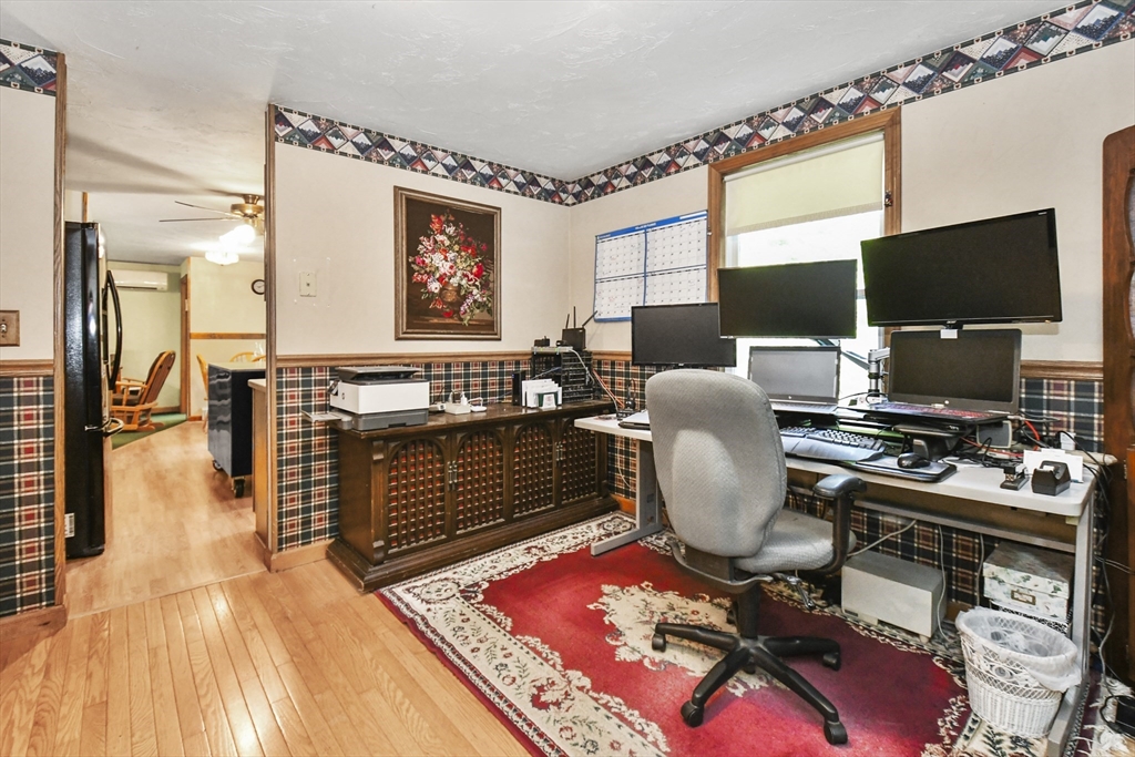 549 Chestnut Hill Road Millville, MA 01529 - Photo 14 of 38 a view of a livingroom with workspace and a window